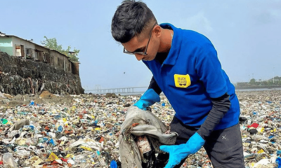 malhar kalambe cleaning Mumbai beaches - the reelstars